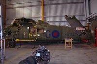 XT764 @ EDUD - Tucked away in a hangar on this army air field in Germany, mid 90's. - by Marc Heesters