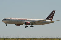 N387AX @ DFW - Omni Air landing at DFW Airport - by Zane Adams