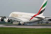 A6-EDP @ EGCC - Emirates newest A380 touching down on RW23R - by Chris Hall