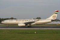 A6-EYJ @ EGCC - Etihad Airways - by Chris Hall