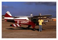 G-ARHT @ EGNH - Piper Caribbean G-ARHT and  owner John Lowry on Southport Beach 1972. John did pleasure flights from the sands at Southport in the seventies following long tradition. His predesessor used a Dragon Rapide Biplane. Tell us of earlier pilots and planes. - by Sim