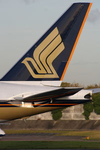 9V-SWS @ EGCC - Singapore Airlines - by Chris Hall
