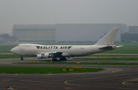 N704CK @ EHAM - At a very wet and miserable Amsterdam