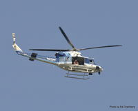 N22PP - Chopper flying above DC during a rally near the Lincoln Memorial - by Ed Chambers