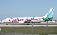 9Y-POS @ MIA - Caribbean 737 - by Florida Metal