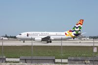 VP-CKW @ MIA - Cayman Airways 737 - by Florida Metal