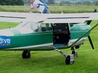 VH-DIJ @ YLIL - The jump door on the Melbourne Skydive Cessna 182 VH-DIJ.