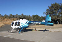 N209EC @ O61 - Parked on the tarmac in Cameron Park......yet the A/FD clearly states, Helicopter parking not
authorized.  Awesome flaunt against those rotorcraft bigots! - by BadWool