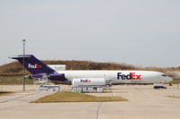 N284FE @ KCID - At the FedEx hangar.