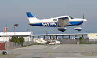 N4378N @ KSQL - Locally-based 1984 Piper PA-28-181 near touchdown @ San Carlos, CA - by Steve Nation