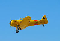 N7522U @ KWVI - 1952 CCF Harvard Mk IV painted as USN SNJ-5 BuAer 91044 F/044 Navy OAKLAND yellow cs & red band landing @ Watsonville Fly-In - by Steve Nation