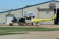 UNKNOWN @ GPM - Bell 204 under rebuild at Grand Prairie Municipal