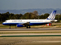 N423UA @ KLAX - Take off from LAX - by Jeff Sexton