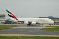 A6-EDL @ EGCC - Emirates Airbus A380 taxiing Manchester Airport. - by David Burrell