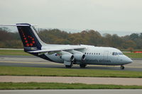 OO-DJX @ EGCC - Brussels Airlines BAE Avro 146-RJ85 Taxiing - Manchester Airport - by David Burrell