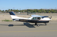 N628TT @ KCCR - Returning, locally-based 1978 Cessna T210N taxiing to East ramp at Buchanan Field - by Steve Nation