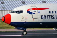 G-DOCX @ EGCC - British Airways B737 sporting a red nose - by Chris Hall