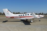 N414CM @ KTLR - 1980 Cessna 414A with winglets and UI logo on tail @ Tulare, CA for International Ag Expo - by Steve Nation