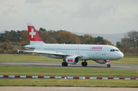 HB-IJJ @ EGCC - Swiss Airlines Airbus A320-214 taxiing Manchester Airport. - by David Burrell