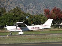 N65831 @ POC - Landing on runway 26L - by Helicopterfriend