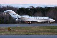 N930QS @ ORF - NetJets Aviation's 2000 Cessna 750 Citation X N930QS (FLT EJA930) rolling out on RWY 23 after arrival from Northeast Philadelphia (KPNE) in the early evening. - by Dean Heald
