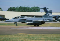 39-7 @ EGVA - Saab Gripen NG 39-7 has an attractive tail painting applied and is seen here on the runway of RAF Fairford during the depatures of the RIAT-2010. - by Nicpix Aviation Press/Erik op den Dries