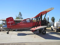 N9926 - Hughes Flying Service (Riverdale, CA) dark red 1974 G-164A rigged for spreading dry material @ Brian Hughes' airstrip - by Steve Nation