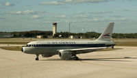 N745VJ @ RSW - US Airways A319 waiting at RSW - by Mauricio Morro