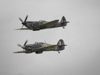 G-OXVI @ EGVA - Spitfire TD248 and Hurricane BE505  in formation at RIAT 2010 - by Manxman