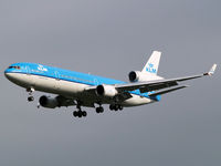 PH-KCG @ AMS - Landing on runway C18 of Amsterdam Airport. - by Willem Goebel