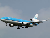 PH-KCA @ AMS - Landing on runway C18 of Amsterdam Airport - by Willem Goebel