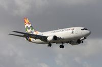 VP-CKZ @ MIA - Cayman 737 landing Runway 9 - by Florida Metal