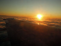 YL-BBE @ INFL - Sunrise over the Baltic Sea, on route from Helsinki to Riga - by Micha Lueck
