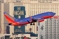 N229WN @ LAS - Southwest Airlines N229WN (FLT SWA3736) climbing out from RWY 1R en route to Phoenix Sky Harbor Int'l (KPHX). - by Dean Heald