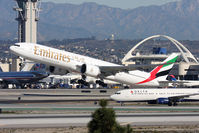 A6-EGE @ LAX - Emirates A6-EGE (FLT UAE218) departing RWY 25R en route to Dubai Int'l (OMDB/DXB). - by Dean Heald