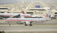 N697AN @ KLAX - Arriving at LAX - by Todd Royer