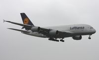 D-AIME @ MIA - Lufthansa A380 landing in rain Runway 9