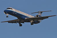 N14923 @ KORD - ExpressJet/United Express Embraer EMB-145LR, ASQ5969 arriving from CYUL, RYW 28 approach KORD. - by Mark Kalfas