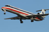 N604AE @ KORD - American Eagle Embraer EMB-145LR, EGF4371 arriving from KOMA, RWY 28 approach KORD. - by Mark Kalfas