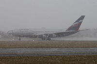 RA-96010 @ LOWS - Take off during a heavy snow storm - by Jens Achauer
