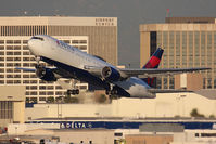 N129DL @ LAX - Delta Air Lines N129DL (FLT DAL2017) departing RWY 25R en route to Las Vegas McCarran Int'l (KLAS).  One of two special flights today to Las Vegas for the 2012 Consumer Electronics Show, which runs Jan 10-13, 2012. - by Dean Heald
