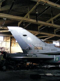 ZE204 @ EGOS - inside the Aircraft Maintenance & Storage Unit hangar - by Chris Hall