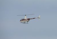 N422RX @ CNO - Heading west in an air taxi towards the fuel station - by Helicopterfriend