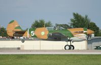 N40PN @ KOSH - Curtiss P-40N - by Mark Pasqualino