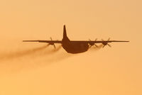 UR-CGV @ EGBB - Meridian Antonov An-12BP departing into the sunrise - by Chris Hall
