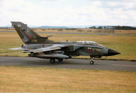 ZA563 @ EGQS - Tornado GR.1 of 15(Reserve) Squadron taxying to Runway 05 at RAF Lossiemouth in September 1994. - by Peter Nicholson
