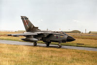 ZA559 @ EGQS - Tornado GR.1, callsign Mitre 3, of 15(Reserve) Squadron taxying to Runway 05 at RAF Lossiemouth in September 1994. - by Peter Nicholson
