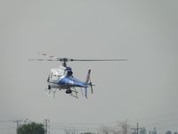 N50NT @ CCB - Entering the helipad area and flaring to slow down - by Helicopterfriend