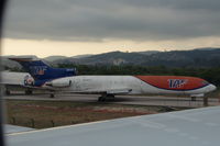 PR-MTK @ SBGR - Boeing 727-222 Freighter parked on a closed taxiway on Guarulhos airport of Sao Paulo, Brasil. The airline, TAF Linhas Aéreas, was grounded by the Brasilian Authorities on june 15, 2010. - by Henk van Capelle