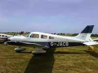 G-JACB @ EGJJ - Parked at Jersey Aero Club - by Peter Kohl